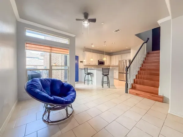 a view of entryway and kitchen