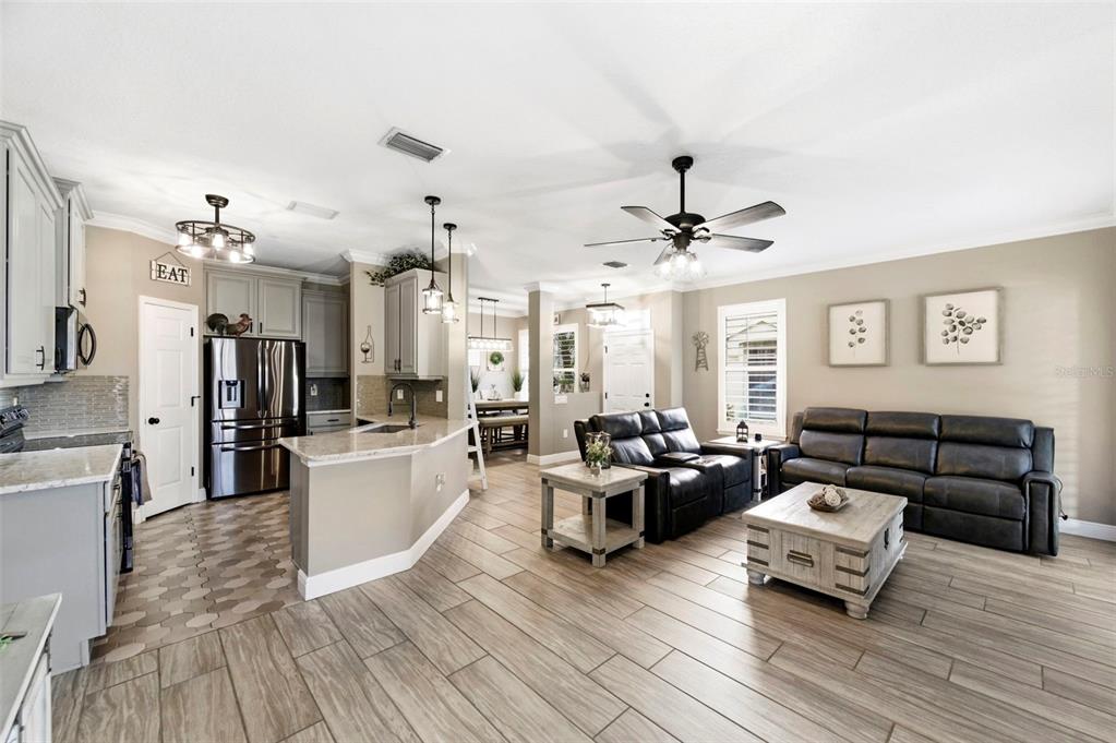 8408 Shallow Creek Court New Port Richey, FL 34653 - Photo 11 of 47 a living room with furniture and wooden floor