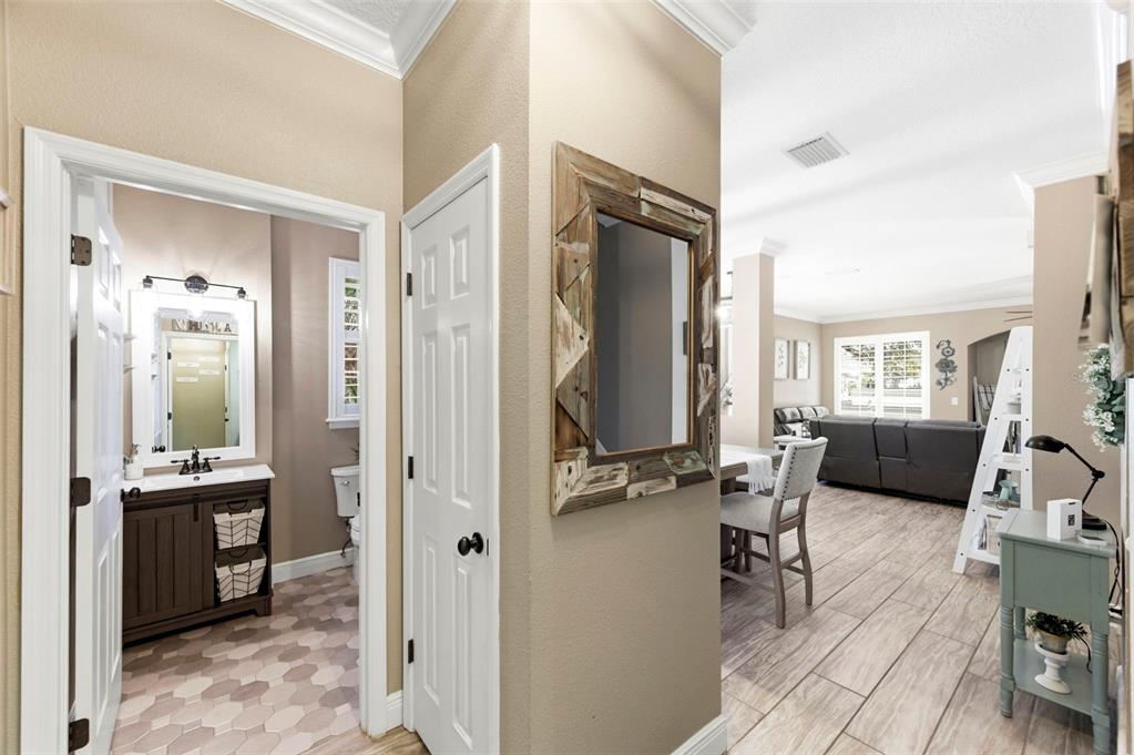 8408 Shallow Creek Court New Port Richey, FL 34653 - Photo 20 of 47 a view of a livingroom with couch and a bathroom