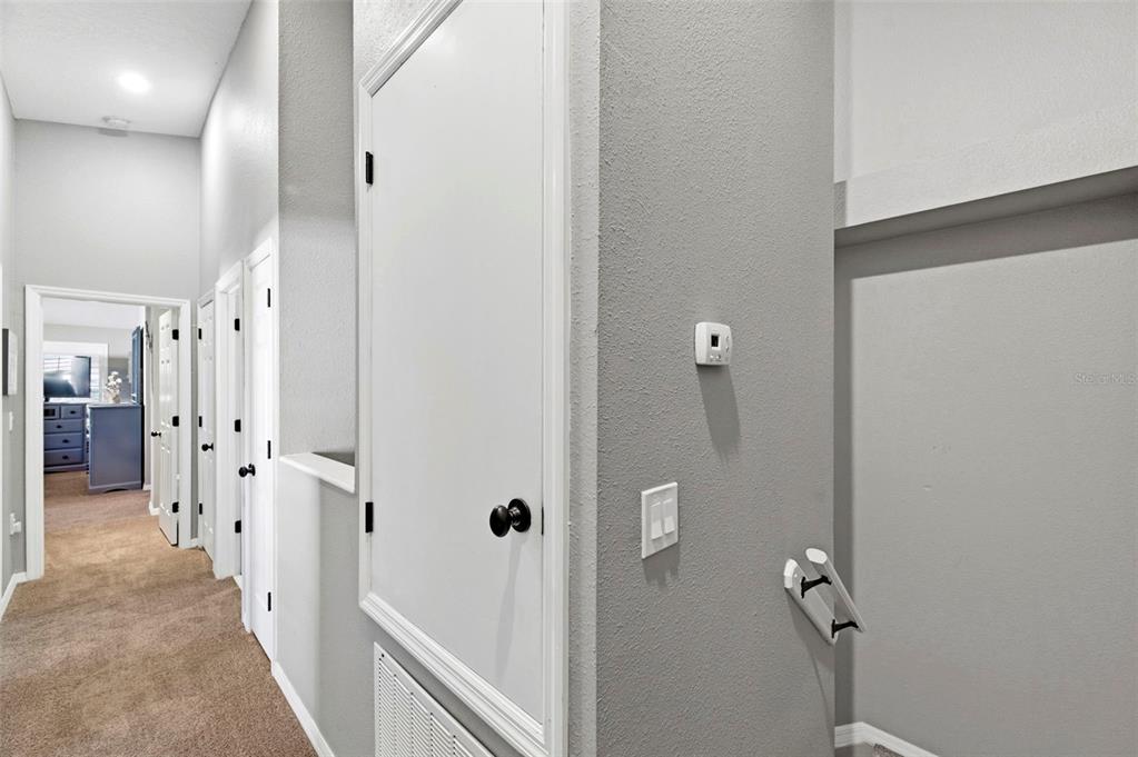 8408 Shallow Creek Court New Port Richey, FL 34653 - Photo 23 of 47 wooden floor in a gallery
