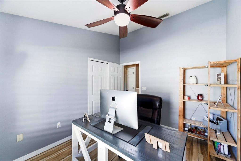 8408 Shallow Creek Court New Port Richey, FL 34653 - Photo 24 of 47 a view of workspace with wooden floor