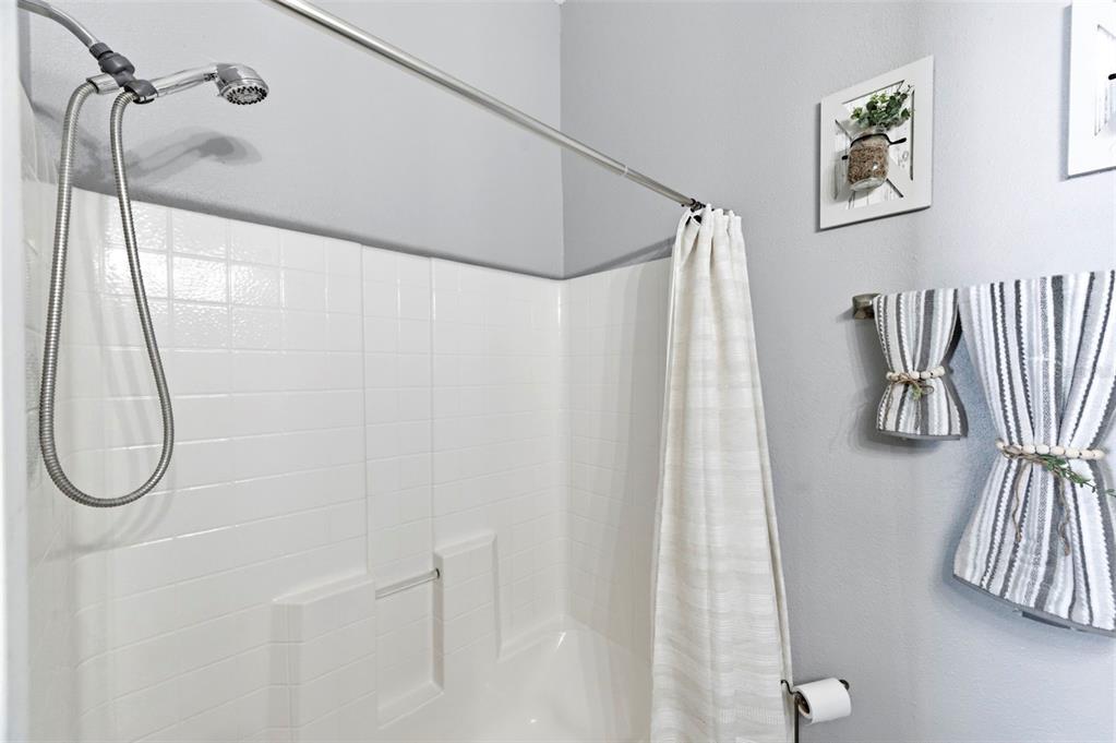 8408 Shallow Creek Court New Port Richey, FL 34653 - Photo 29 of 47 a bathroom with a shower