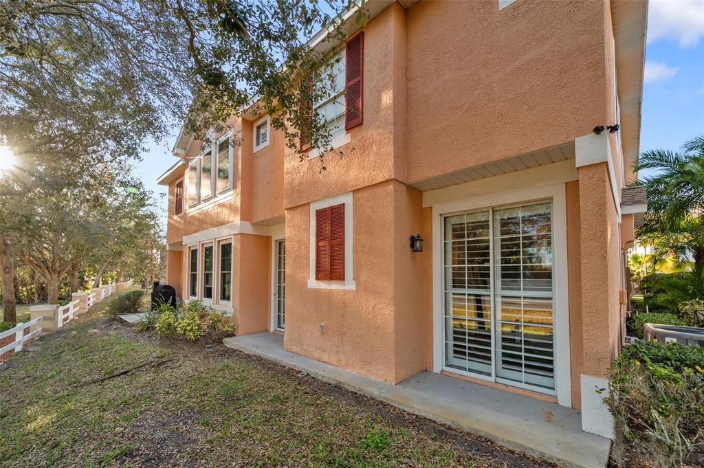 8408 Shallow Creek Court New Port Richey, FL 34653 - Photo 39 of 47 front view of a house with a yard