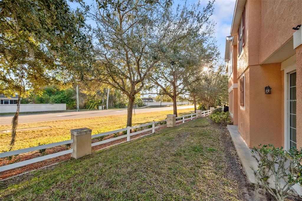 8408 Shallow Creek Court New Port Richey, FL 34653 - Photo 40 of 47 a view of a yard with an outdoor space