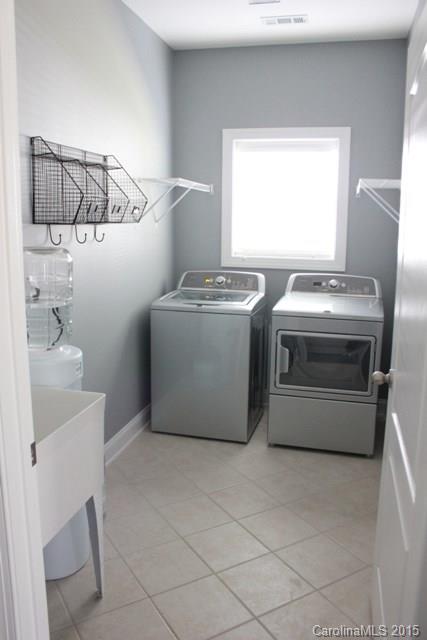 1028 Ridgehaven Road Waxhaw, NC 28173 - Photo 10 of 18 a utility room with washer and dryer