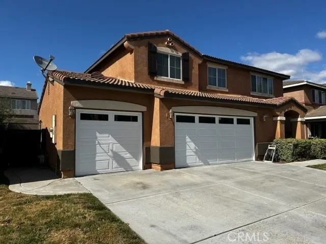 a view of a house with a garage