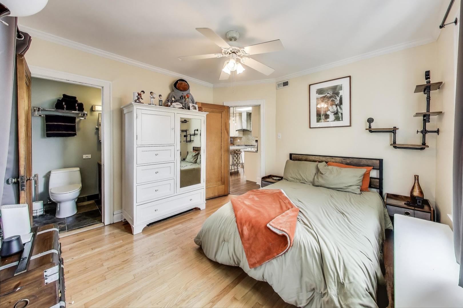 2700 West Carmen Avenue Chicago, IL 60625 - Photo 28 of 34 a bedroom with a bed and furniture