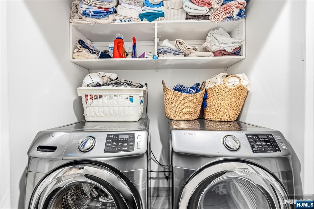 1228 River Road Edgewater, NJ 07020 - Photo 24 of 49 a utility room with dryer and washer