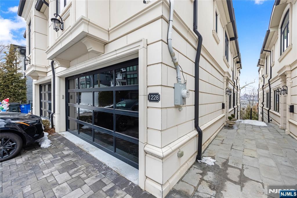 1228 River Road Edgewater, NJ 07020 - Photo 41 of 49 a view of a car park in front of house