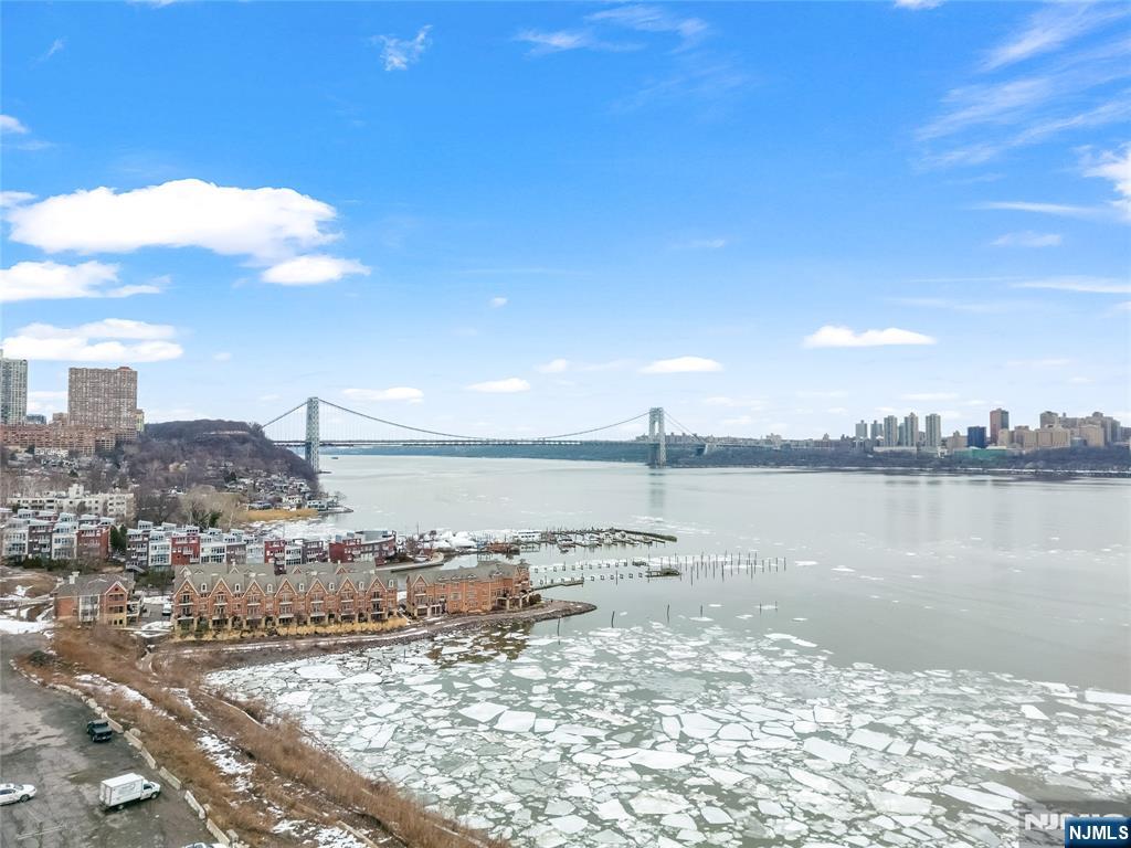 1228 River Road Edgewater, NJ 07020 - Photo 42 of 49 a view of a lake and a city
