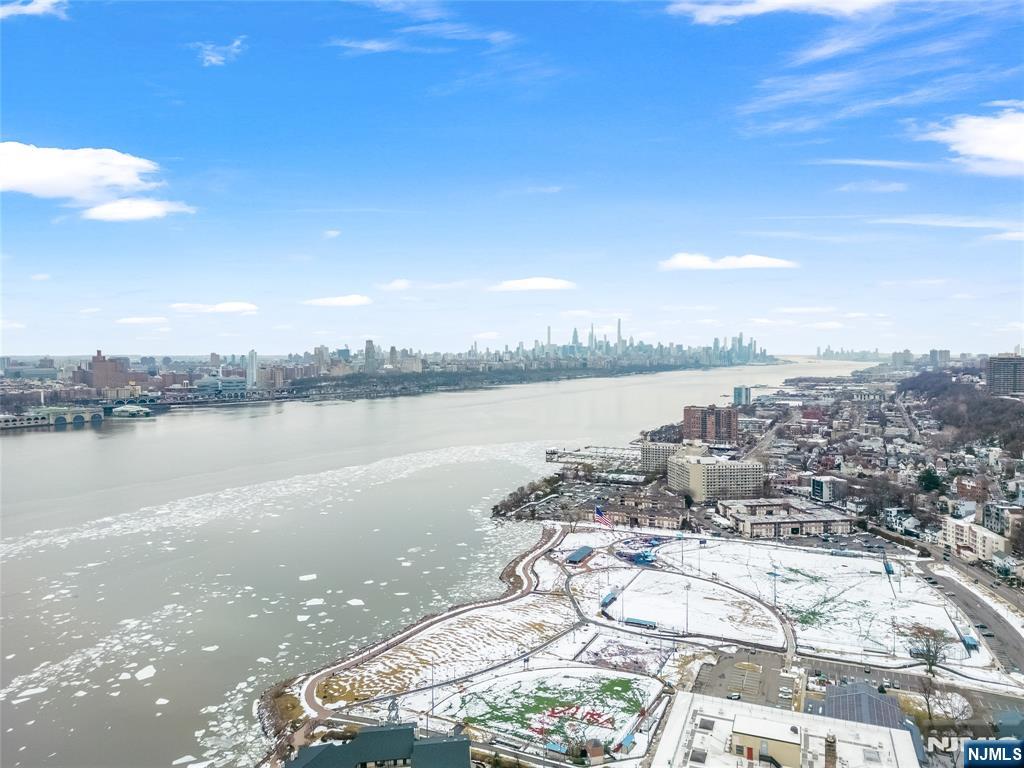 1228 River Road Edgewater, NJ 07020 - Photo 43 of 49 a city view with a lake view