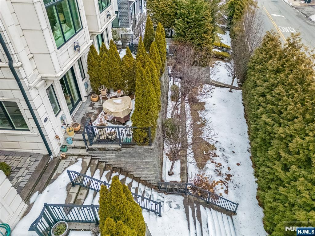 1228 River Road Edgewater, NJ 07020 - Photo 49 of 49 an aerial view of a swimming pool with outdoor seating