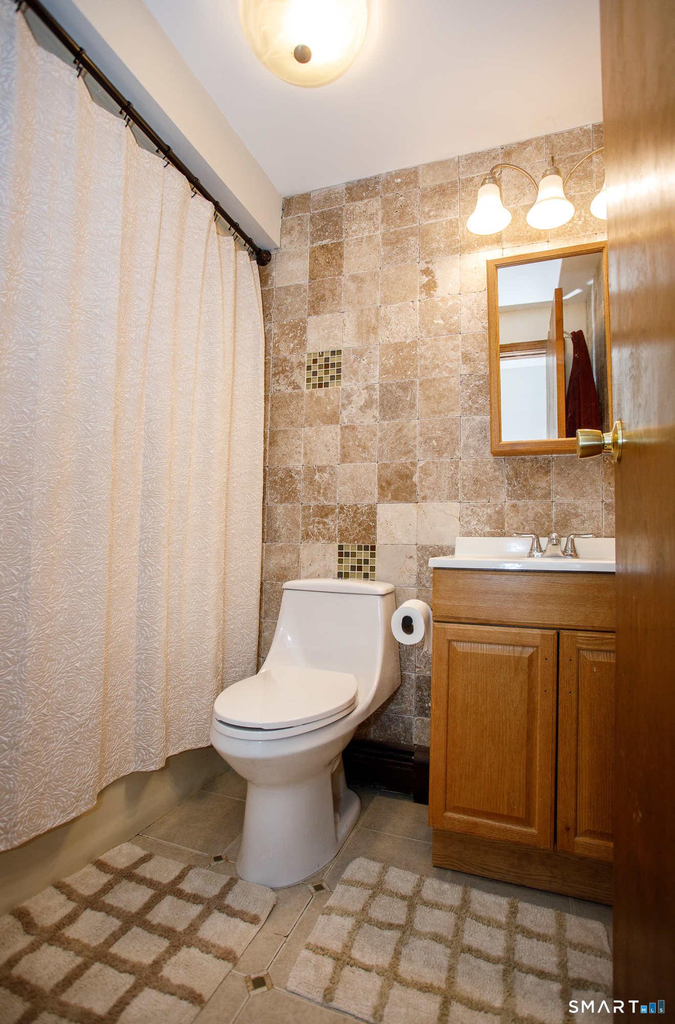 110 Pautipaug Hill Road Sprague, CT 06330 - Photo 23 of 33 a bathroom with a sink toilet and shower