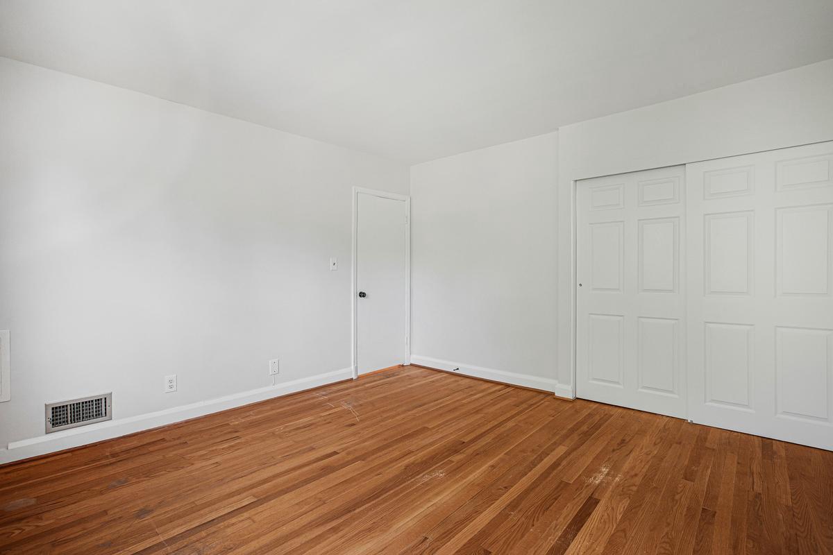 1016 Winsford Road Towson, MD 21204 - Photo 21 of 42 a view of empty room with wooden floor