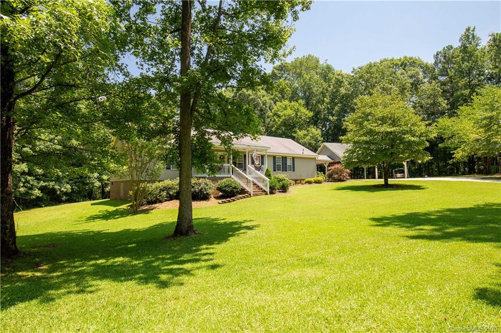 2229 Flat Creek Road Lancaster, SC 29720 - Photo 3 of 29 a view of yard with swimming pool and green space