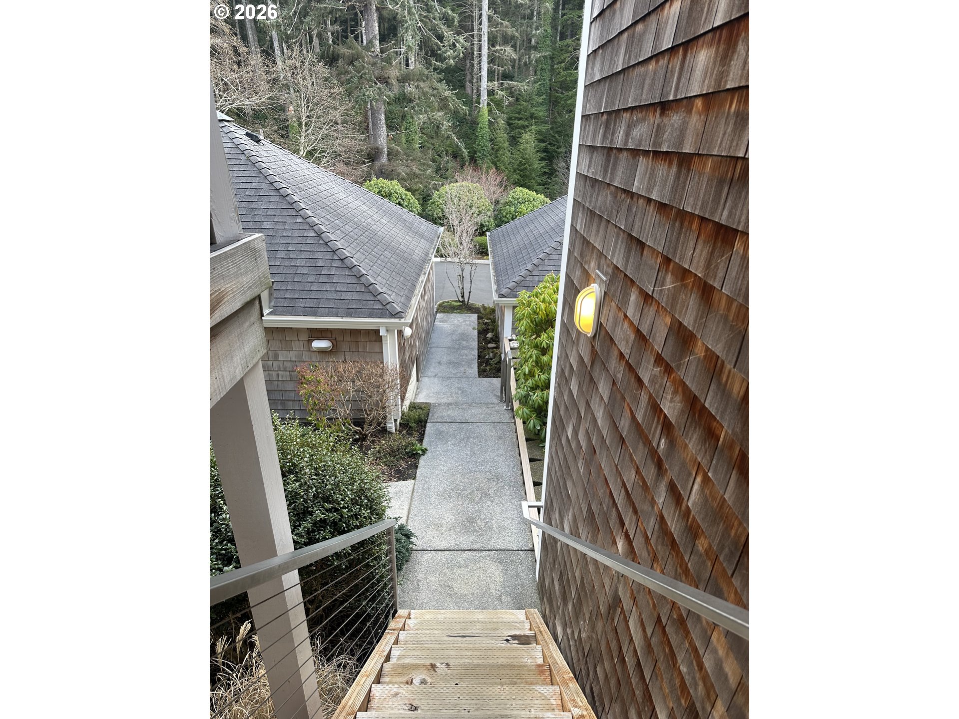 3912 Sunset Boulevard, Unit A202 Seaside, OR 97138 - Photo 2 of 32 a backyard of a house