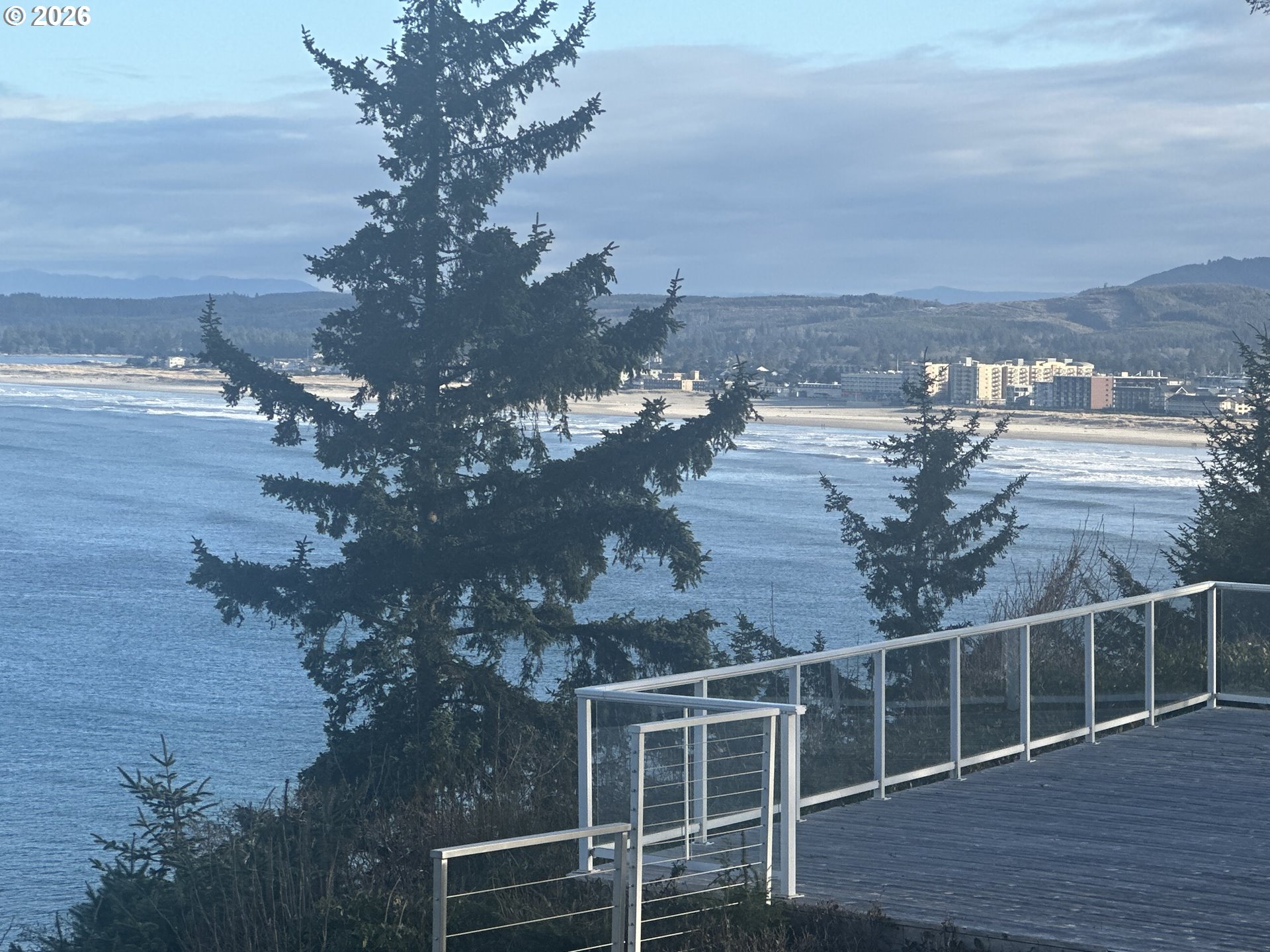 3912 Sunset Boulevard, Unit A202 Seaside, OR 97138 - Photo 30 of 32 a view of a sky from a balcony