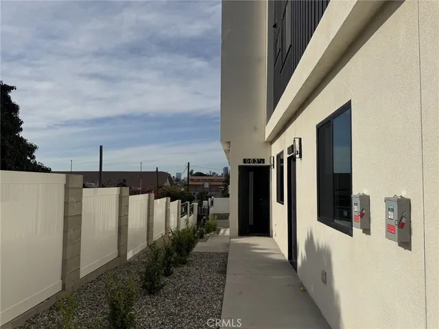 a bedroom with a bed and a cabinets
