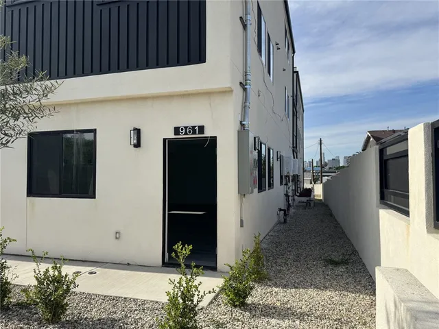 a kitchen with counter top space and stainless steel appliances