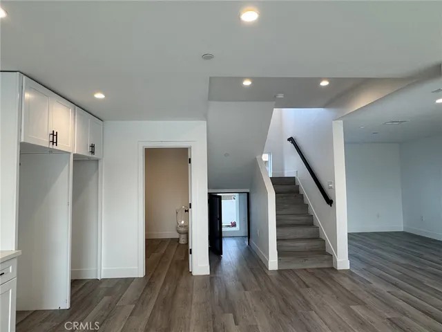 a view of entryway with wooden floor