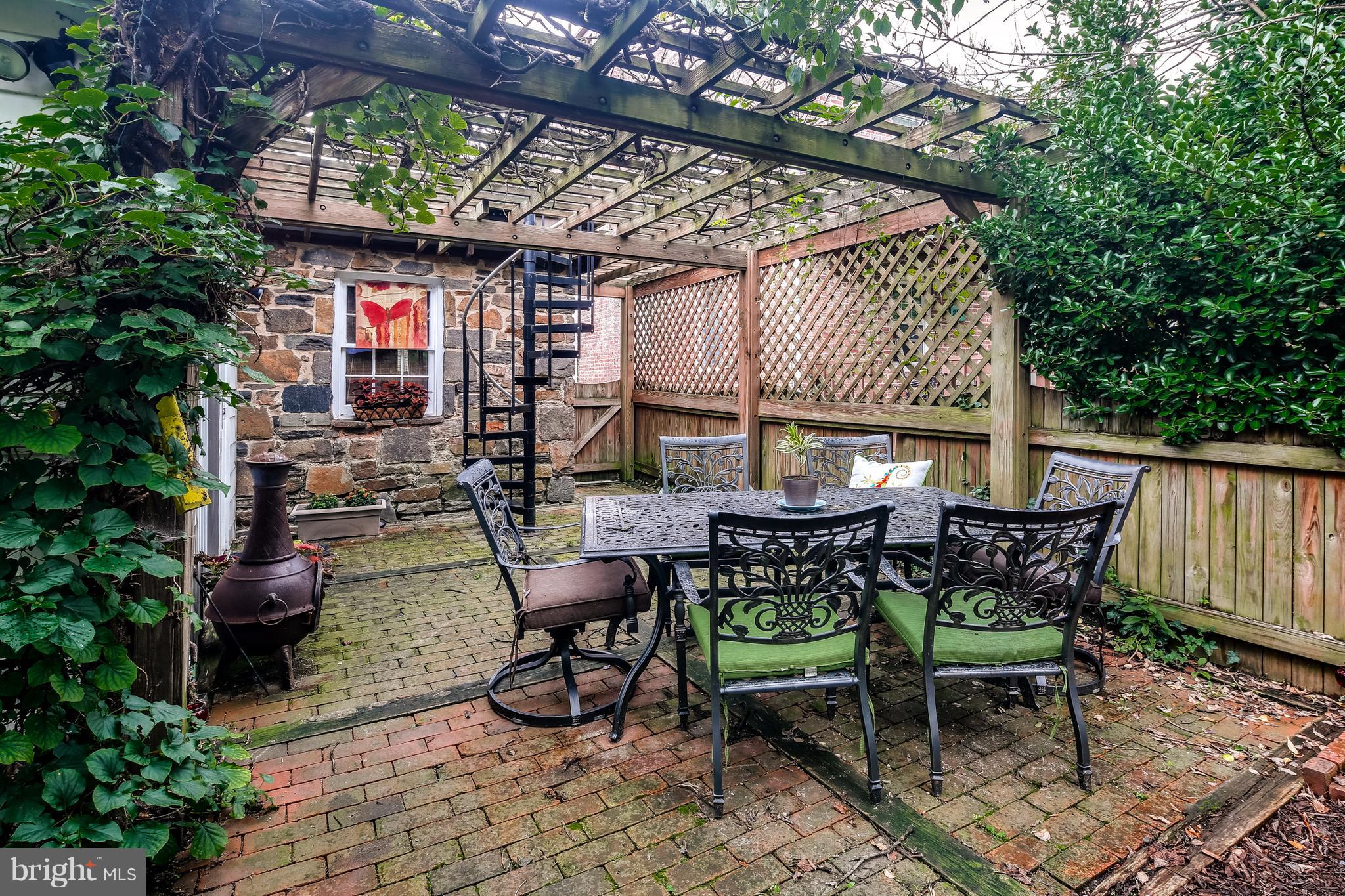 14 Tanglewood Road Baltimore, MD 21228 - Photo 12 of 26 Beautiful pergola provides great shade for dining!