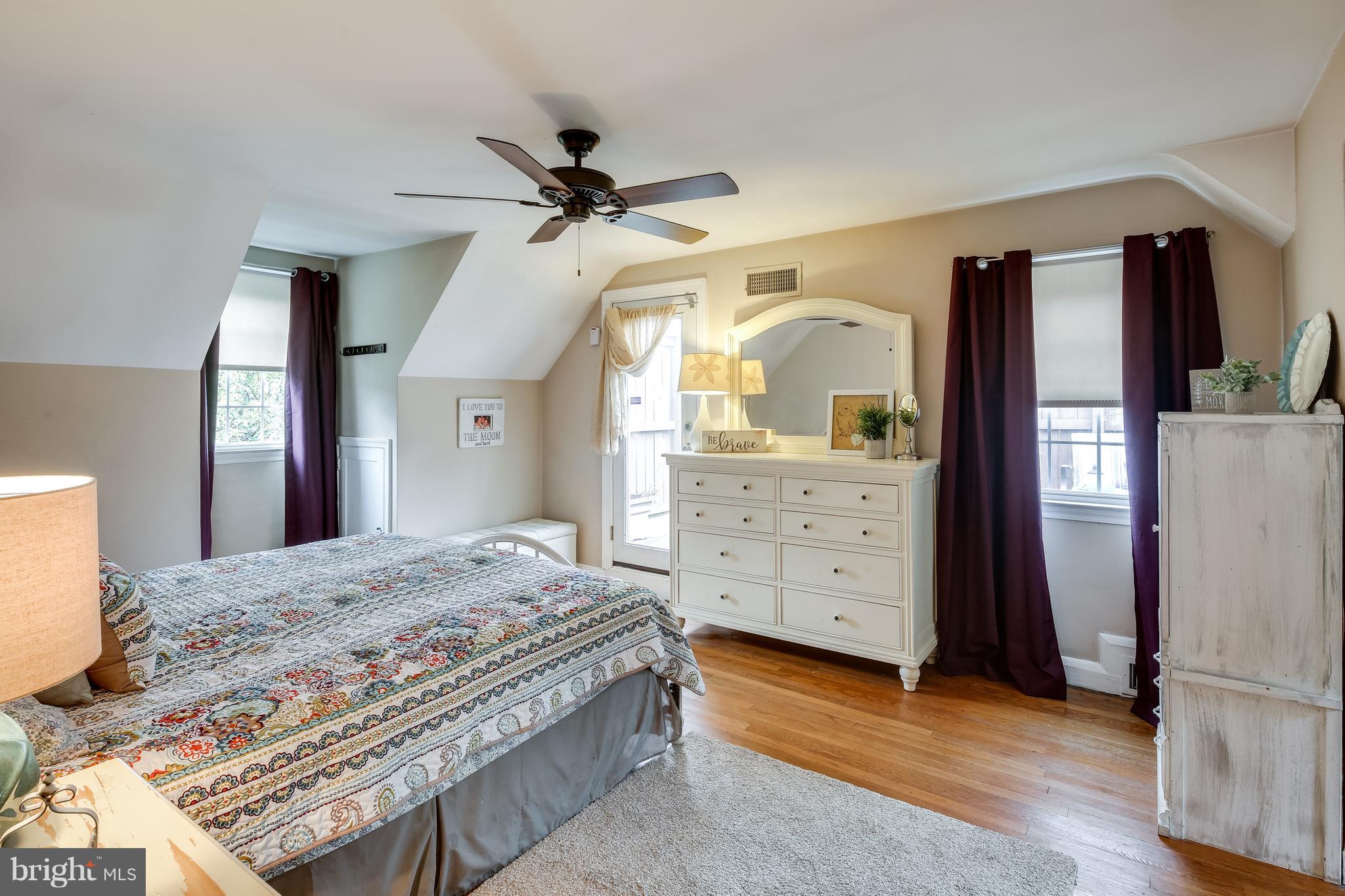 14 Tanglewood Road Baltimore, MD 21228 - Photo 13 of 26 Master bedroom w/ ceiling fan and dormer windows!