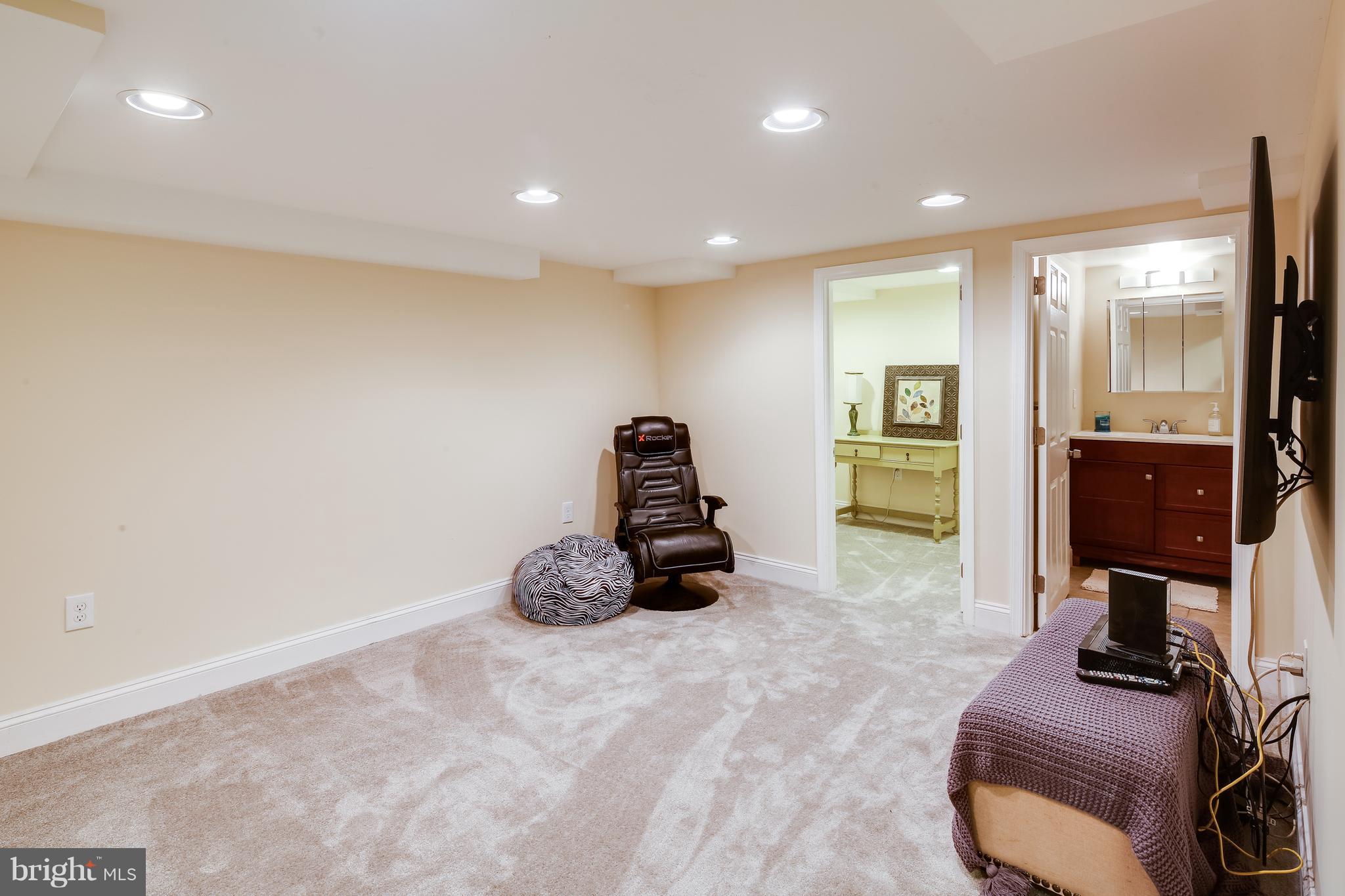 14 Tanglewood Road Baltimore, MD 21228 - Photo 22 of 26 Sweet rec room in the Basement with new carpet!