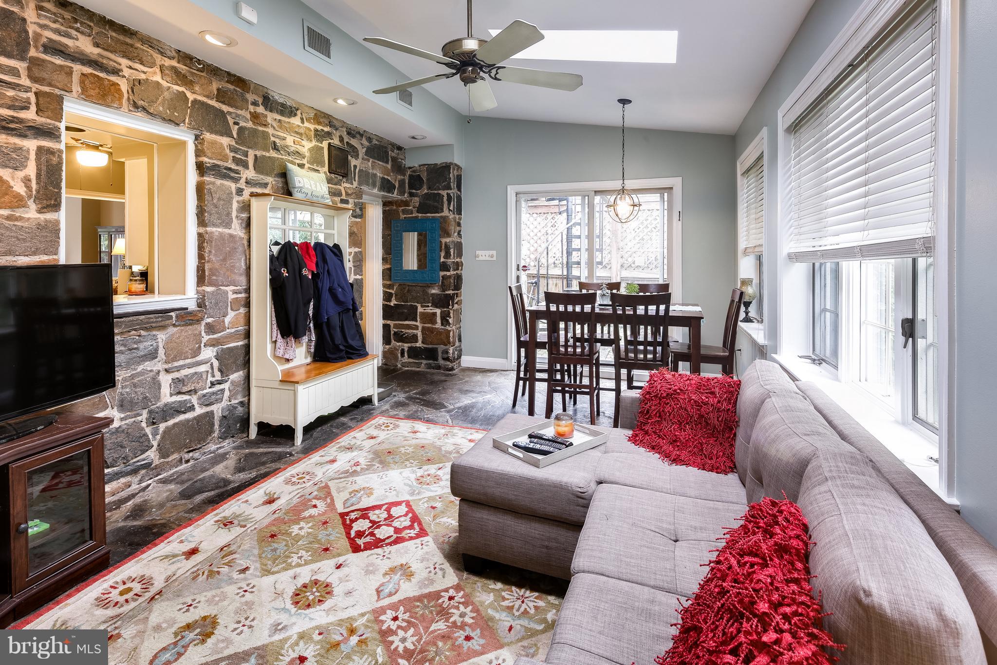 14 Tanglewood Road Baltimore, MD 21228 - Photo 10 of 26 Bright Family Room w/ original stone wall!