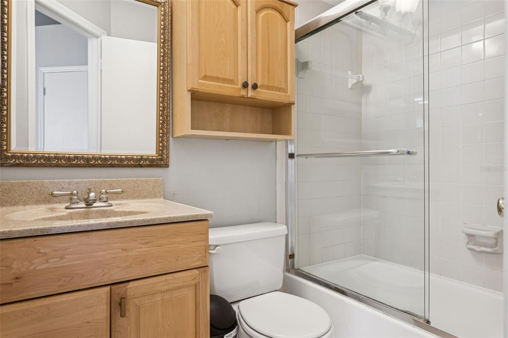 11356 Stratton Park Drive Temple Terrace, FL 33617 - Photo 19 of 25 a bathroom with a sink toilet and shower