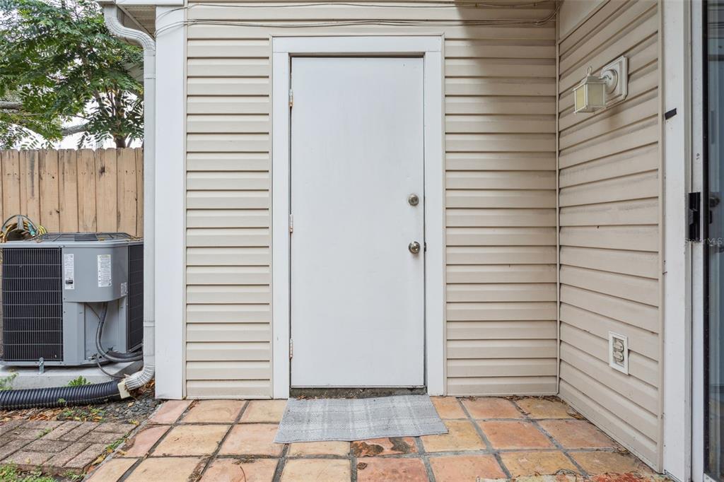 11356 Stratton Park Drive Temple Terrace, FL 33617 - Photo 24 of 25 a view of a bathroom with a door and a window