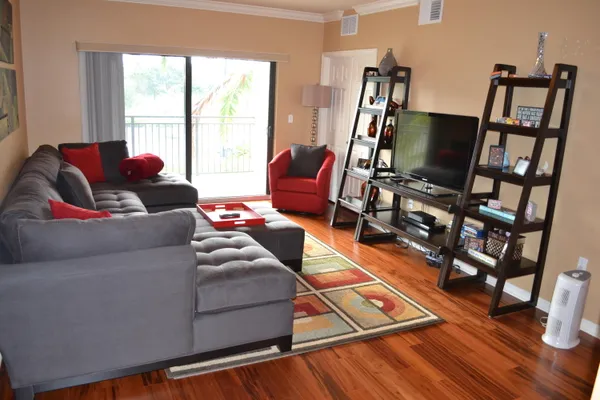 a kitchen with stainless steel appliances granite countertop a stove and a microwave
