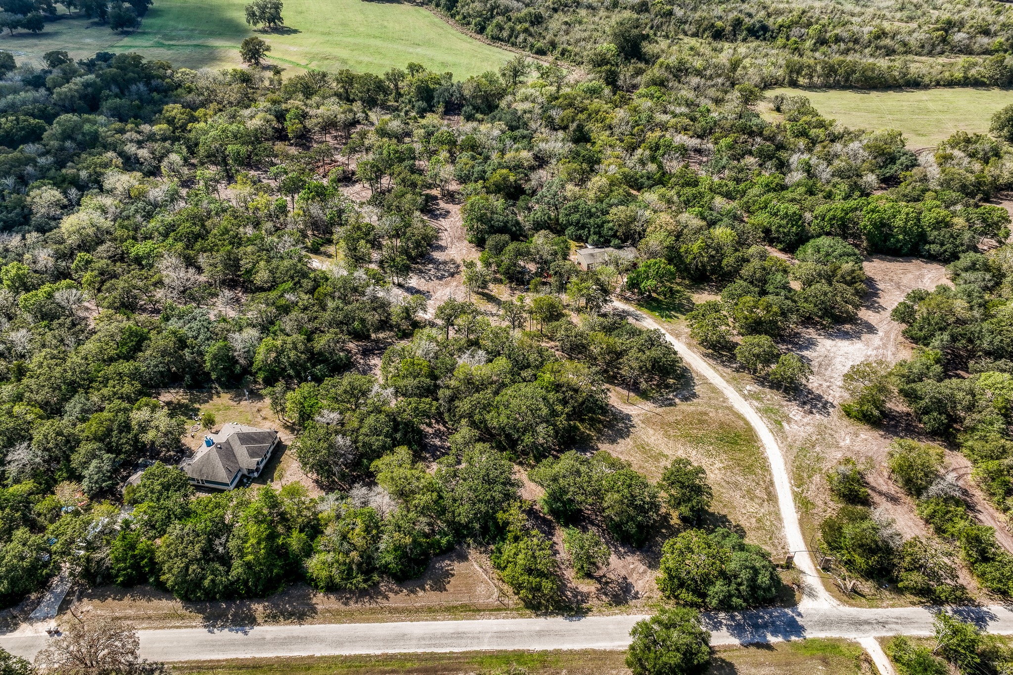 2 Sun Oil Road Brenham, TX 77833 - Photo 34 of 35 an aerial view of residential house with outdoor space and trees all around