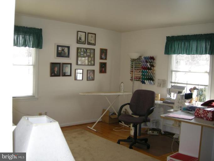 13221 Falls Road Cockeysville, MD 21030 - Photo 9 of 12 a work room with furniture and a window