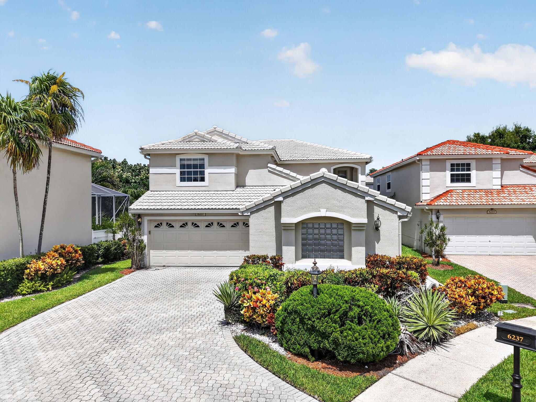 6237 Brava Way Boca Raton, FL 33433 - Photo 4 of 60 52-web-or-mls-DJI_20260708115600_0057_D