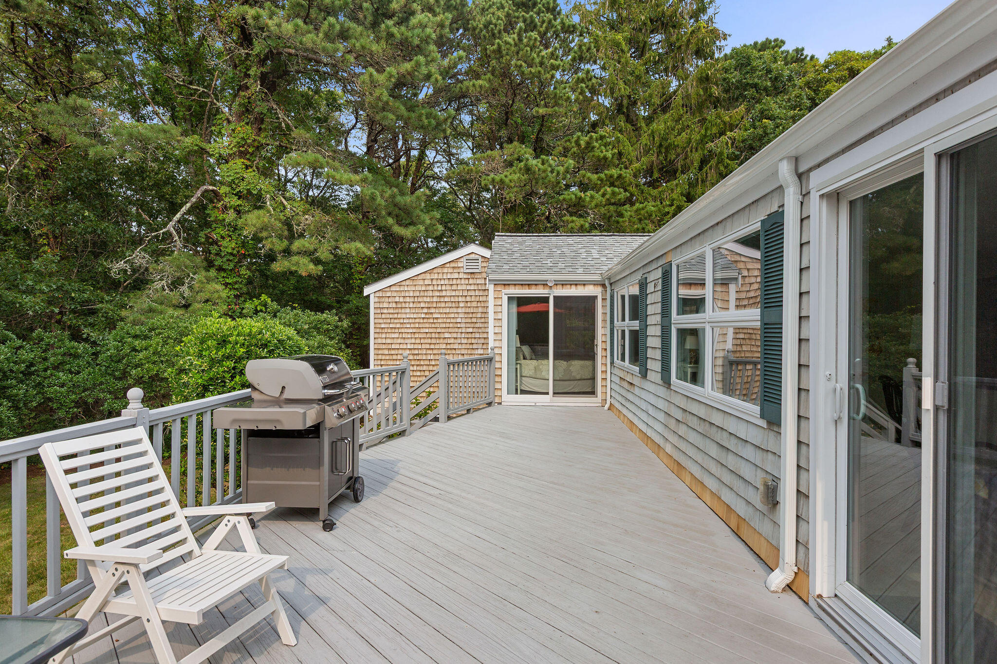 75 Monument Road Orleans, MA 02653 - Photo 19 of 61 a view of a house with backyard and sitting area