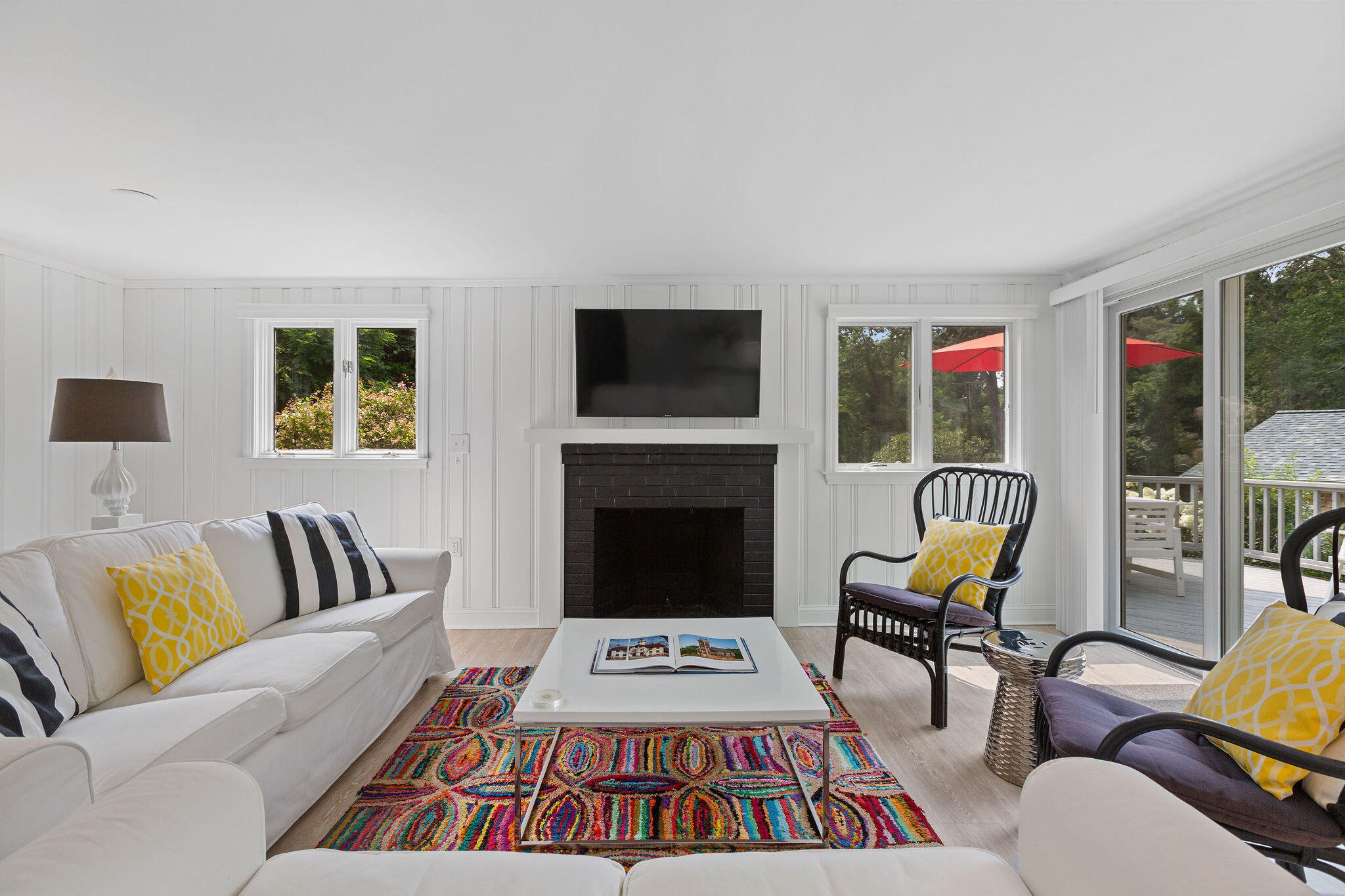 75 Monument Road Orleans, MA 02653 - Photo 39 of 61 a living room with furniture fireplace and window