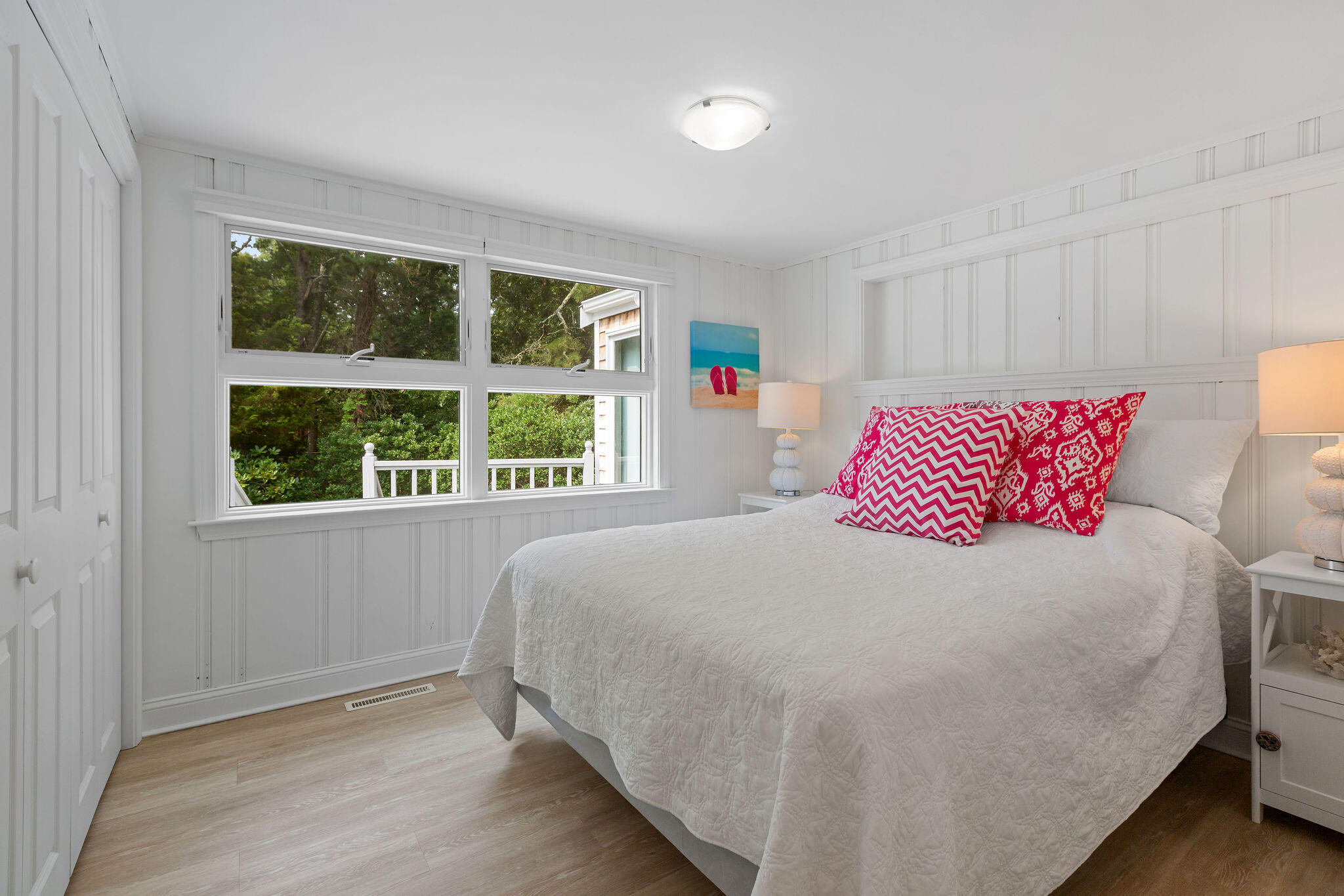 75 Monument Road Orleans, MA 02653 - Photo 48 of 61 a bedroom with a bed and a window