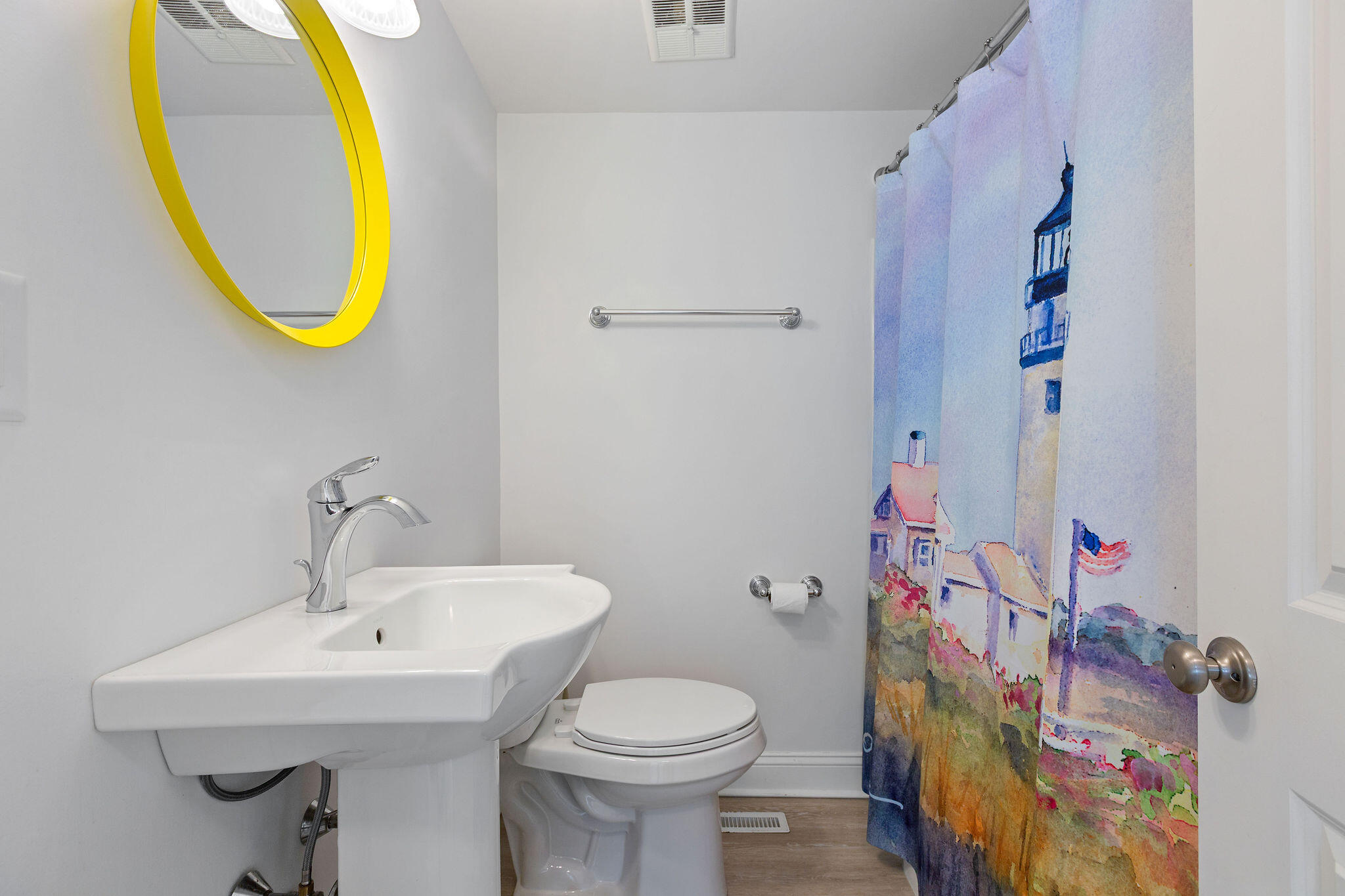 75 Monument Road Orleans, MA 02653 - Photo 51 of 61 a bathroom with a sink and a mirror