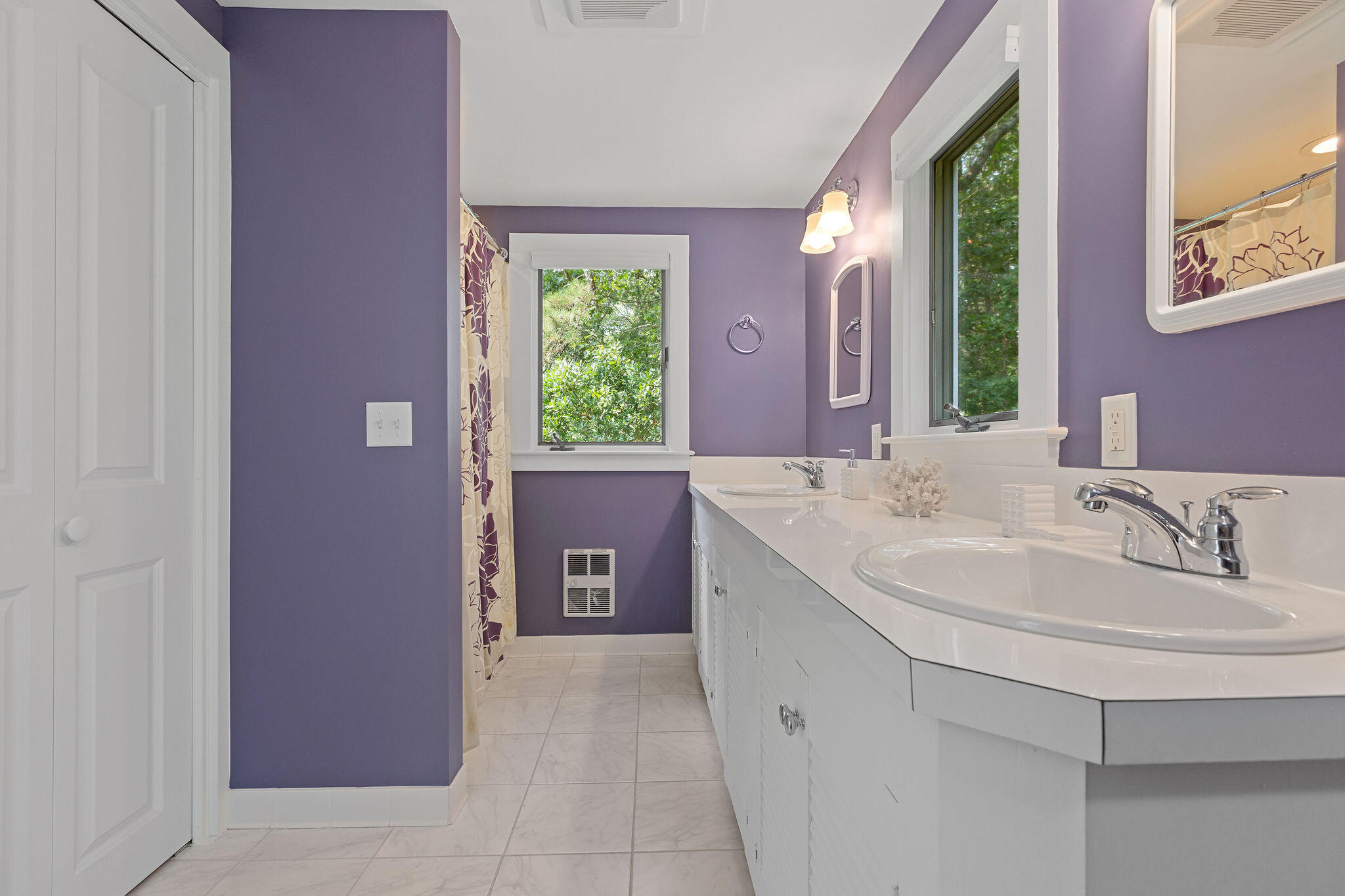 75 Monument Road Orleans, MA 02653 - Photo 56 of 61 a bathroom with a sink and a mirror