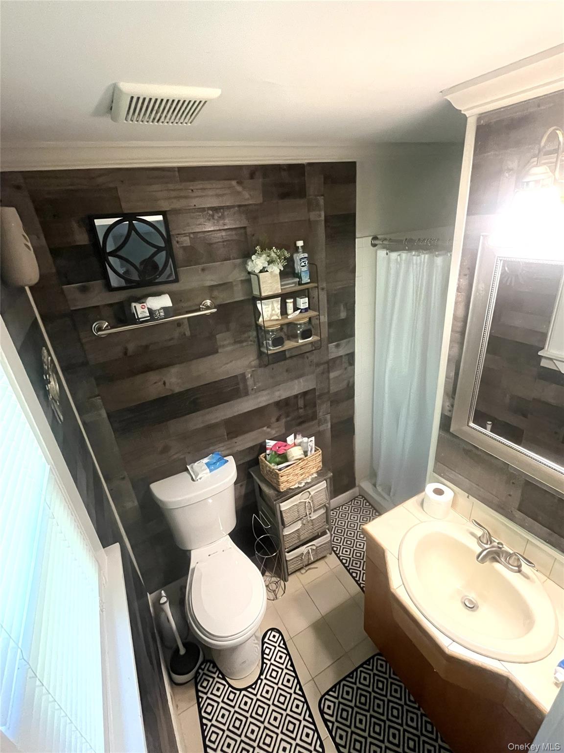 88 West Pine Road Staatsburg, NY 12580 - Photo 14 of 28 Master bathroom is nicely decorated with shiplap walls, tile floor full shower