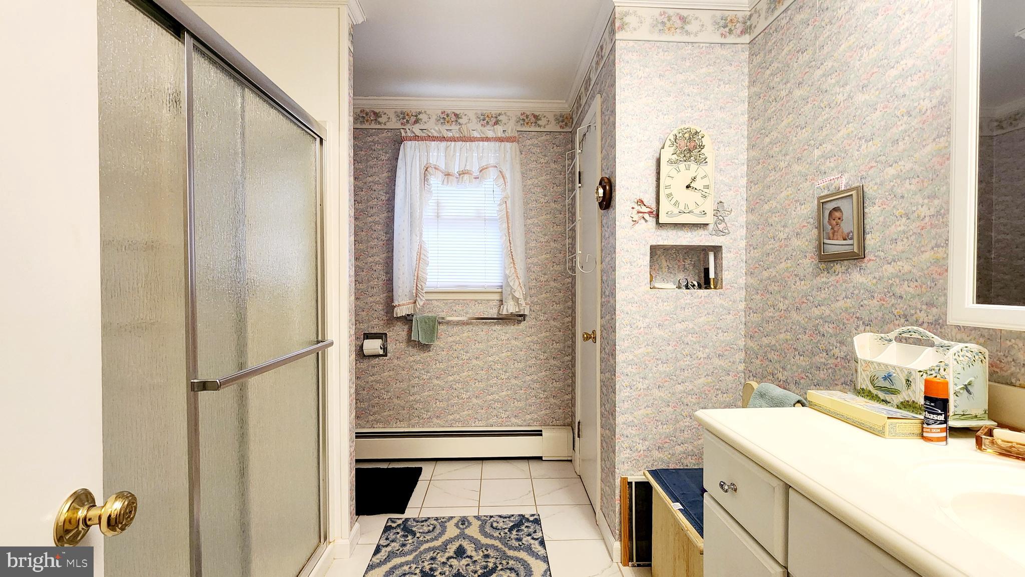 140 Water Street Fairfield, PA 17320 - Photo 19 of 40 a bathroom with a sink toilet and shower