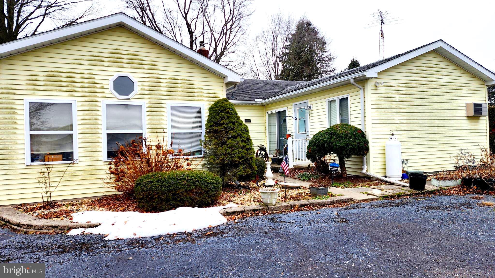 140 Water Street Fairfield, PA 17320 - Photo 36 of 40 a view of a house with yard and plants