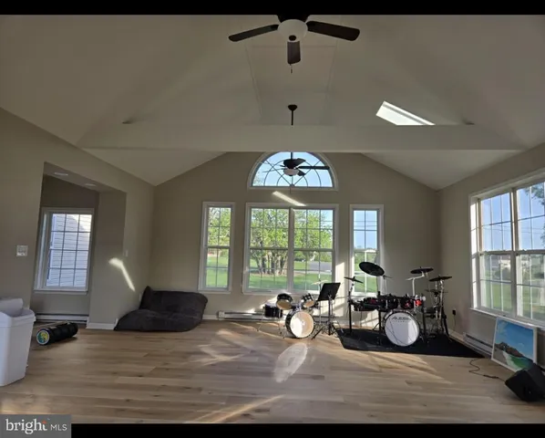 a view of a livingroom with furniture window and outside view