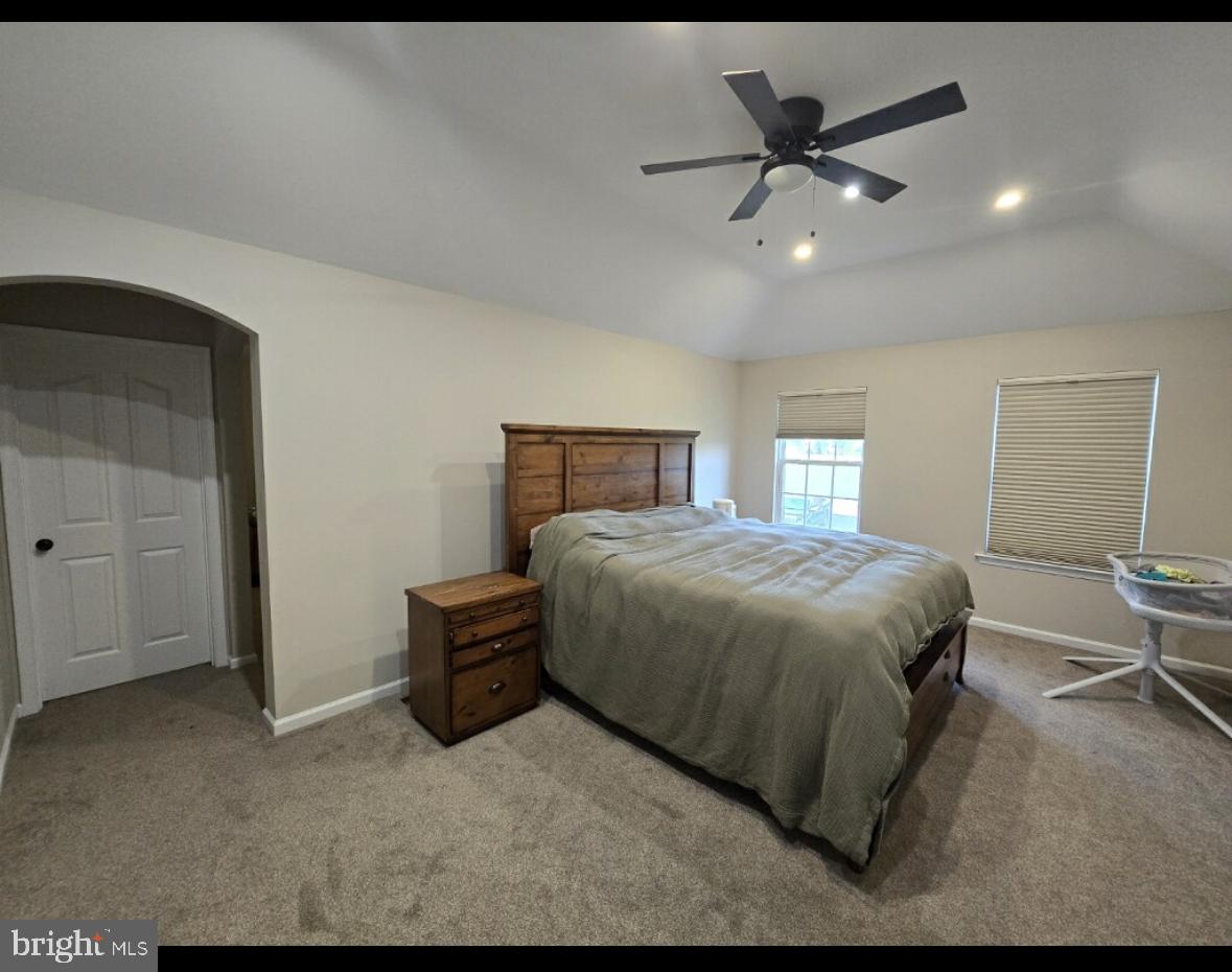 361 Rainey Road Swedesboro, NJ 08085 - Photo 16 of 17 a bedroom with a bed and window