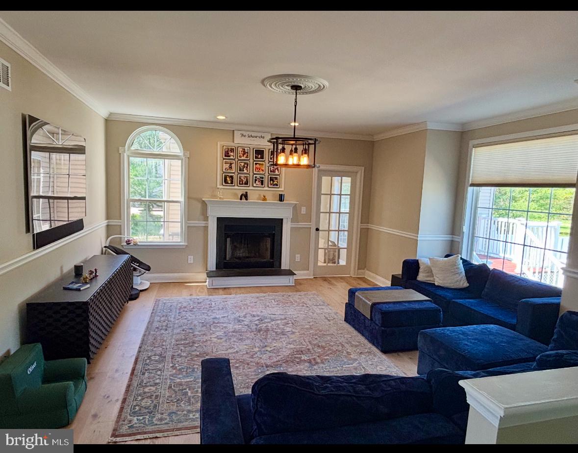 361 Rainey Road Swedesboro, NJ 08085 - Photo 8 of 17 a living room with furniture and a fireplace