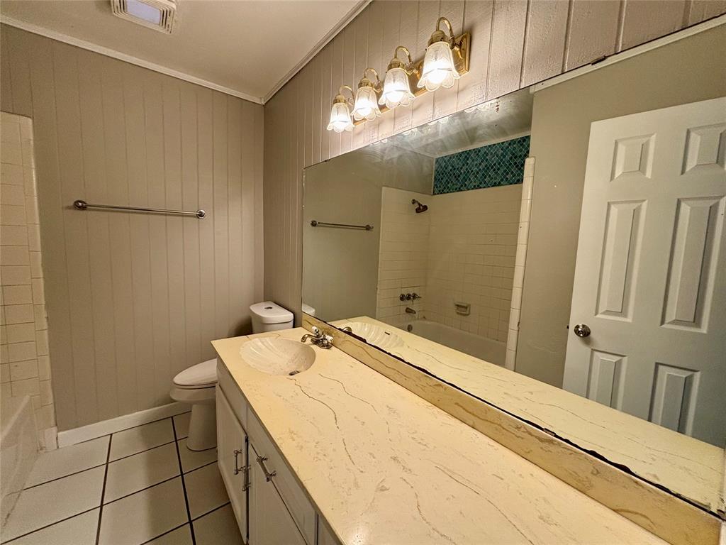 337 Apache Trail Keller, TX 76248 - Photo 14 of 16 a bathroom with a sink and mirror