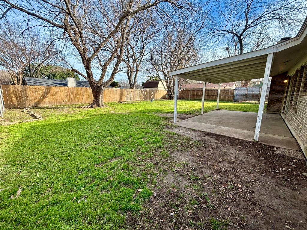337 Apache Trail Keller, TX 76248 - Photo 16 of 16 a view of a backyard with a garden