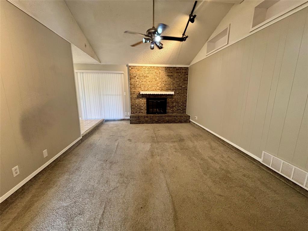 337 Apache Trail Keller, TX 76248 - Photo 6 of 16 an empty room with a ceiling fan and window