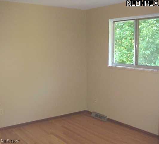 9037 Root Road North Ridgeville, OH 44039 - Photo 10 of 18 2nd bedroom view. Note all wood floors have been refinished.