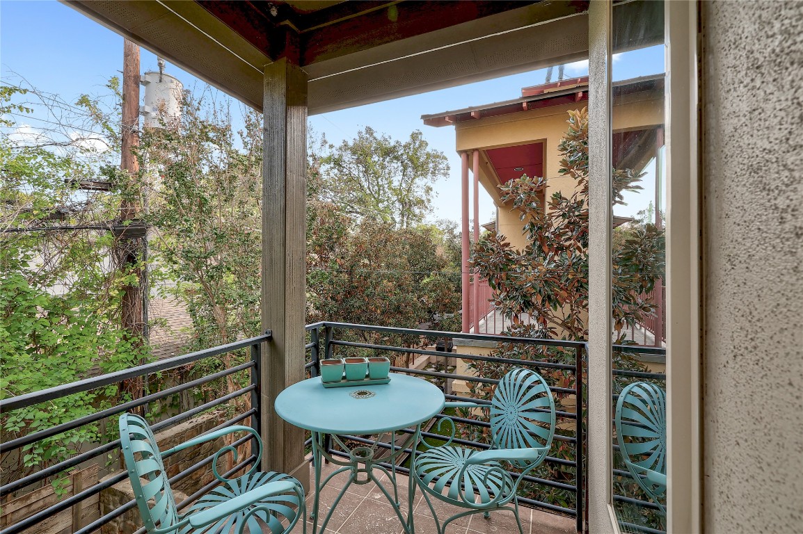1205 Elm Street, Unit 8 Austin, TX 78703 - Photo 13 of 26 Living room opens up to a balcony perfect for morning coffee/tea!